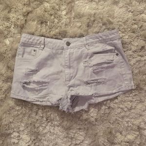 White ripped jean shorts